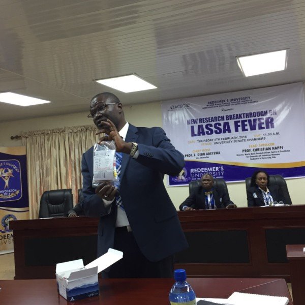 Dr. Christian Happi, Director, African Center of Excellence for Genomics of Infectious Diseases (ACEGID) holding the Pan-Lassa fever rapid diagnostic kit