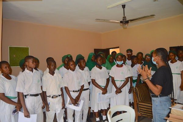 Glorious engaged in a conversation with the DRASA Health & Hygiene Club Ambassadors at Ataoja School of Science, Osogbo